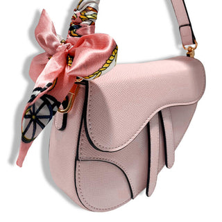 Doe-A-Dear pink saddle purse side view