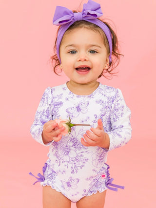 Rufflebutts 1Pc Wisteria Purple Butterfly Garden Toile L/S Swimsuit