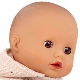 Close-up of Götz Muffin 13 inch baby doll face with sleeping eyes