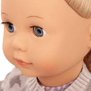 Close-up of Götz Jessica doll with long blonde hair and blue eyes