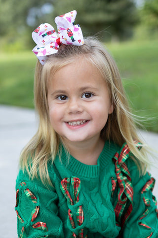 Wee Ones Nutcracker Print Christmas Hair Bow, worn