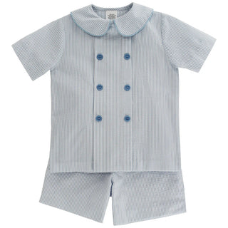 Children's outfit with striped shirt and shorts on a white background