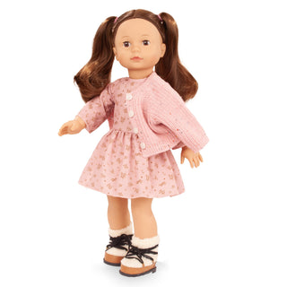 Elisabeth doll wearing knit jacket over floral dress