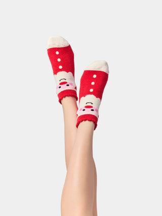 Shiraleah Santa fuzzy socks worn at home