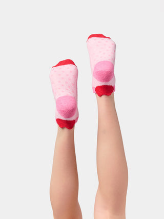 Shiraleah pink bow fuzzy socks worn at home