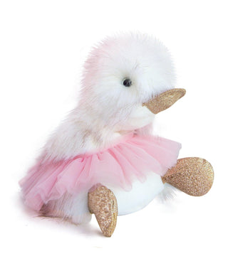 A plush duck toy with a pink tutu and white body with gold glitter feet and beak.