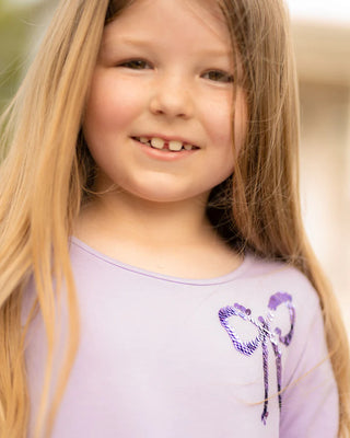 The Yellow Lamb Tinley Lavender Top with Sequin Bow