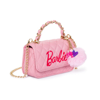 Pink Barbie quilted purse with charm cluster, angled view