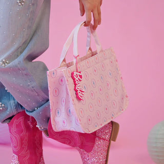Girl carrying Barbie dance tote bag to dance class