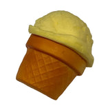 Yellow ice cream cone toy on a clear plastic background