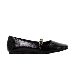 Black flat shoe with a strap on a white background