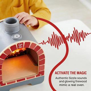 Hape toy pizza oven with sliceable pizza and toppings