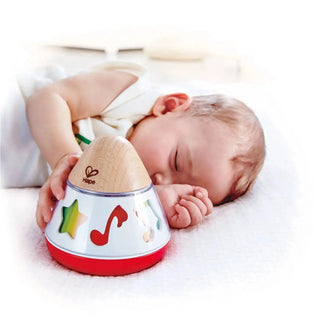 Hape spinning music box with music-note graphics