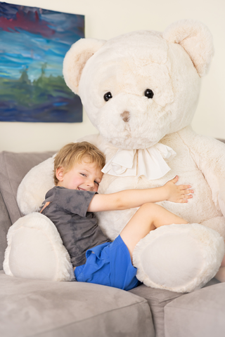 Patrick Huggy Bear giant teddy bear shown next to a smaller Bukowski Mavi bear for size