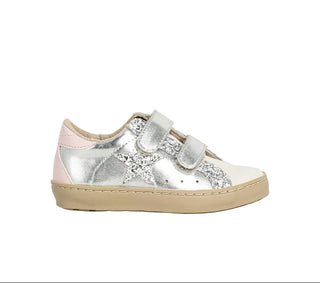 Silver sneaker with pink accents on a white background