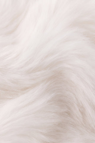 Close-up of Moon the Kitty embroidered face and bow