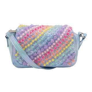 A pastel blue translucent crossbody bag covered in colorful star and bead embellishments, shown against a plain white background.