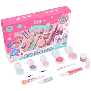 Dream Comes Yule kit contents: eye shadows, blushes, lip gloss, nail polish and glitter gel